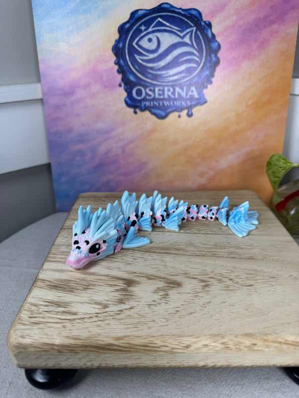 3D printed baby koi dragon shown from an alternate angle