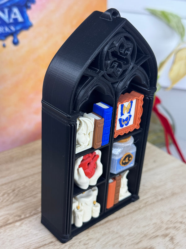 Dark academia bookshelf clicker with books candles and gothic details