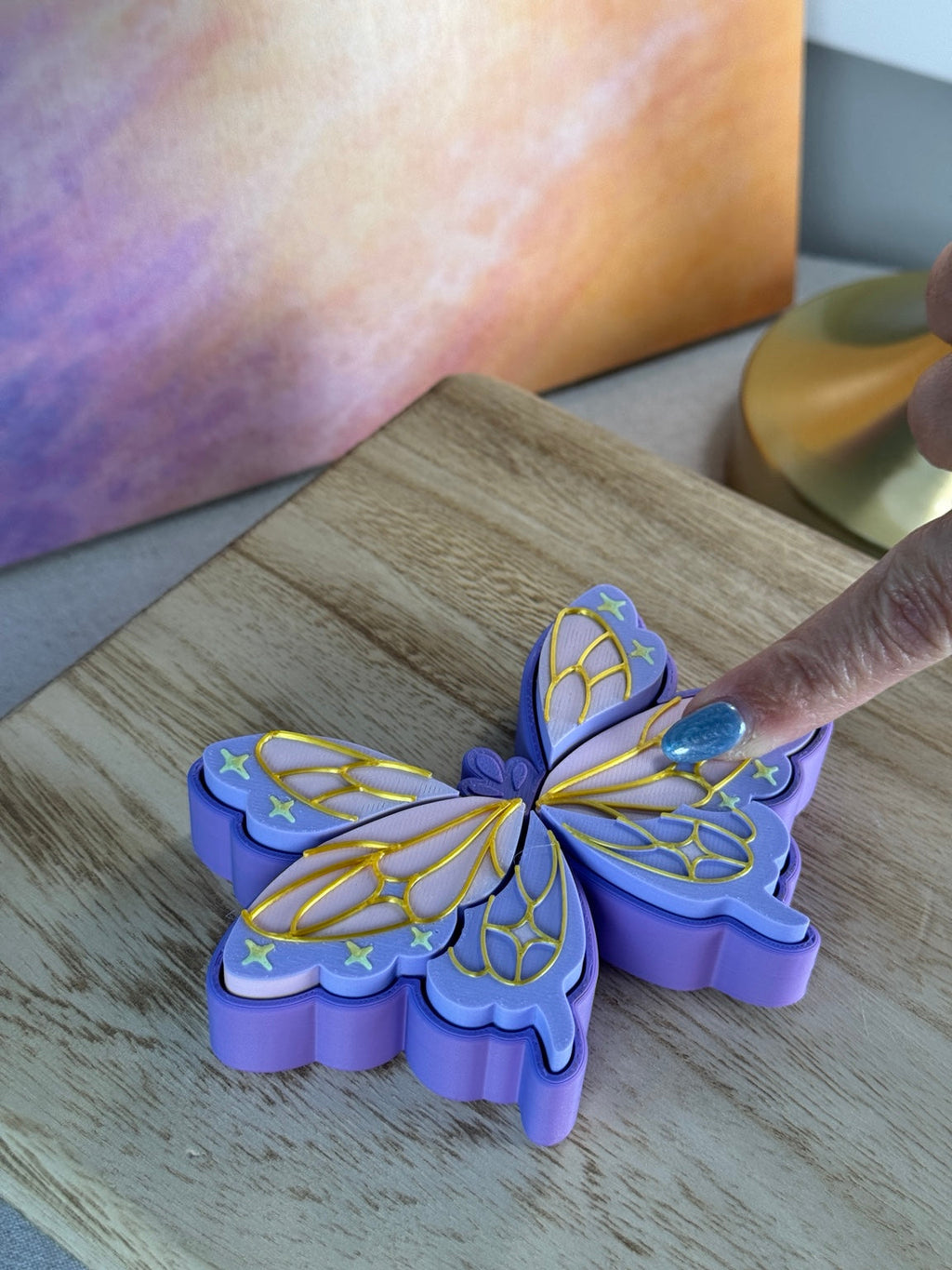 Pressing a butterfly wing to demonstrate the clicker