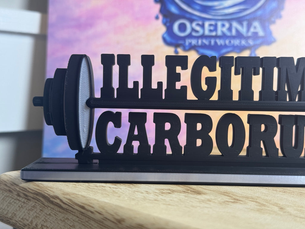 Close-up of left barbell plate detail on 3D printed desk sign